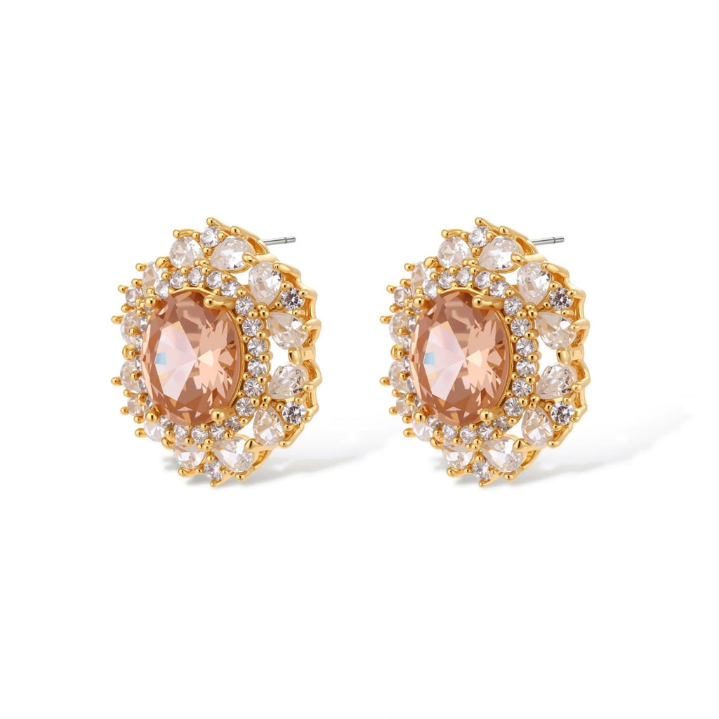 Ornate gold-plated jewelry set featuring peach center stone surrounded by clear AAA cubic zirconia crystals