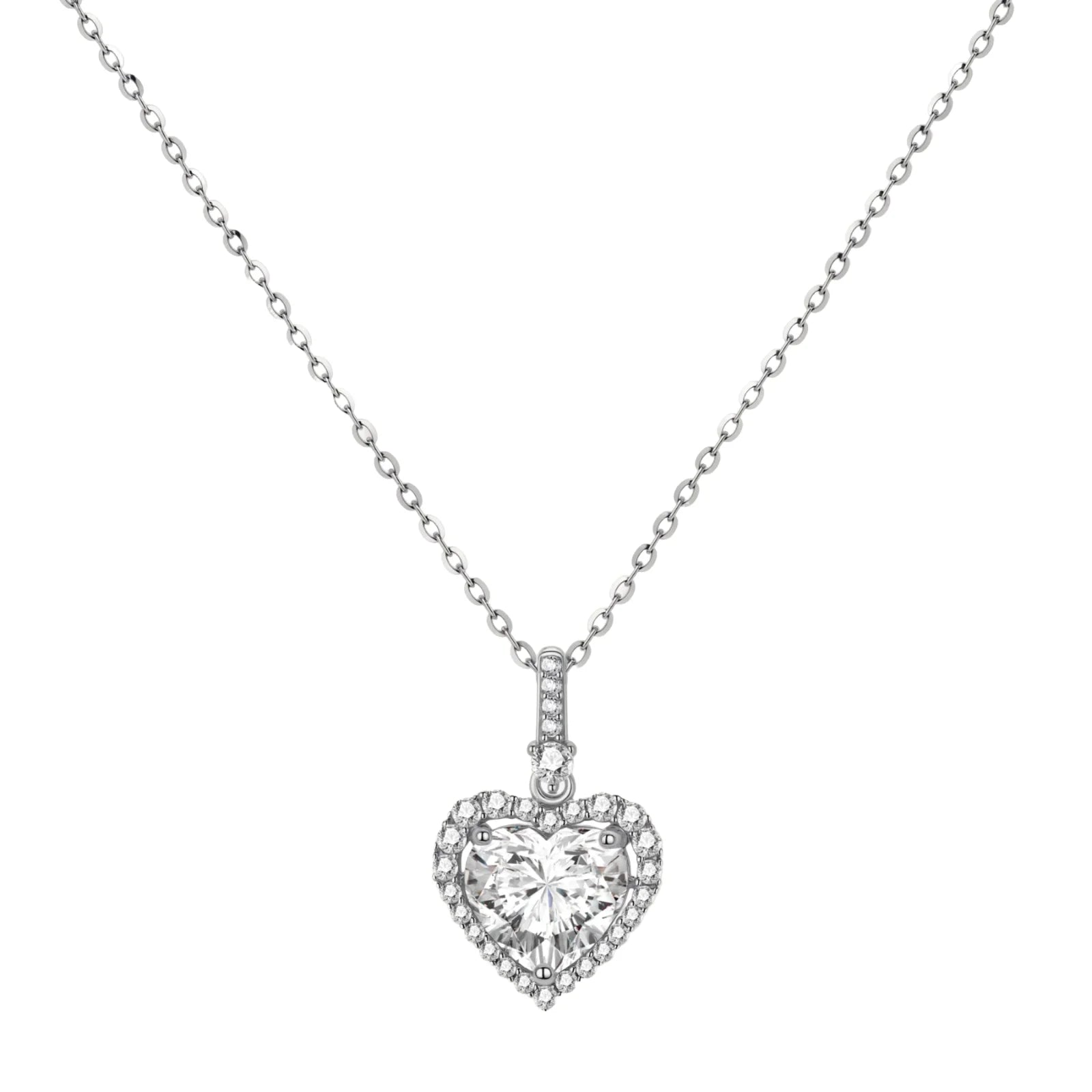 Complete jewelry set with heart-shaped sterling silver pieces featuring brilliant moissanite stones on white background.