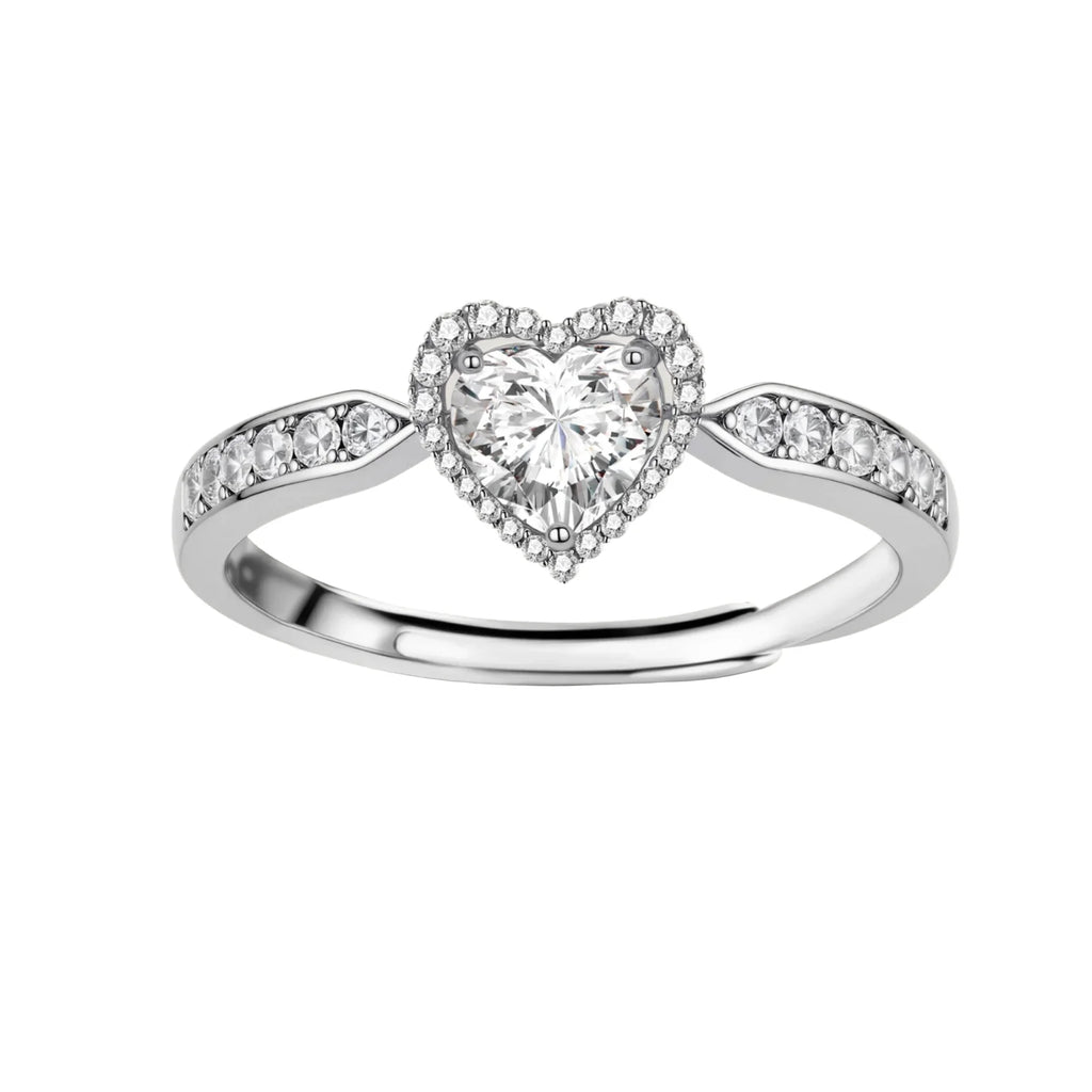 Complete jewelry set with heart-shaped sterling silver pieces featuring brilliant moissanite stones on white background.