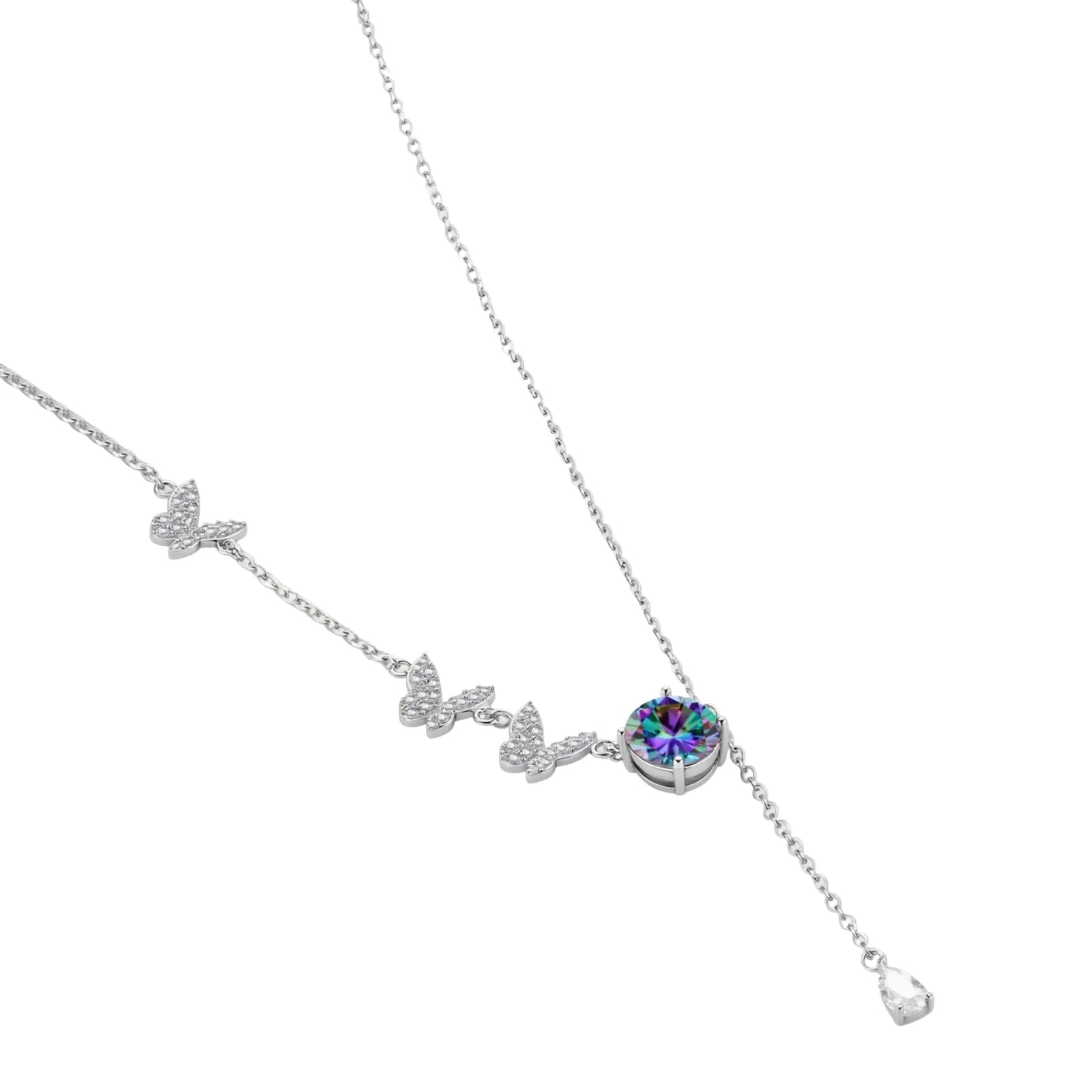 Sterling silver jewelry set with rainbow moissanite stones in clover and butterfly designs on cream background