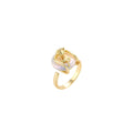 Gold-plated sculptural ring featuring a baroque pearl wrapped in a delicate rose and vine cage design