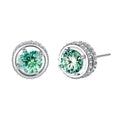 Round green moissanite stud earrings in sterling silver halo settings with brilliant sparkle on white background.