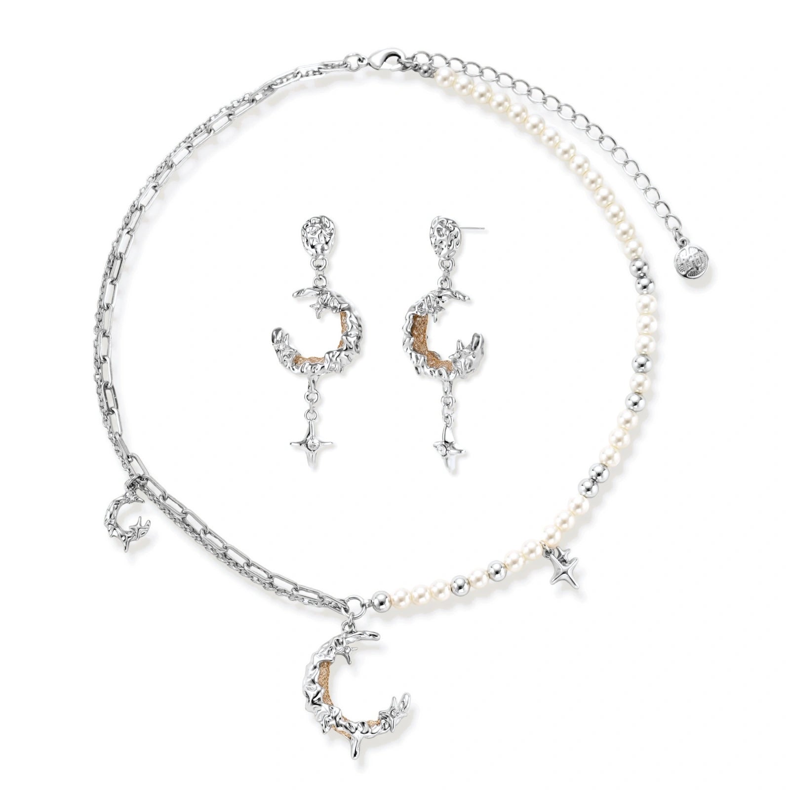 Mixed-metal jewelry set featuring layered necklaces with crescent moon pendant and pearl beads, plus matching star-drop earrings.