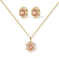 Ornate gold-plated jewelry set featuring peach center stone surrounded by clear AAA cubic zirconia crystals