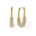 Gold-plated huggie hoop earrings with pavé zirconia stones covering the bottom curve, shown in open and closed positions.
